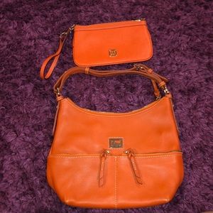 Orange Dooney & Bourke purse with wristlet